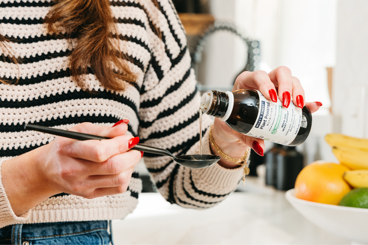 Wiley’s Finest CatchFree® Omega-3 Liquid bottle with SDA-rich Ahiflower® oil, plant-based Omega-3 supplement for heart and brain health.