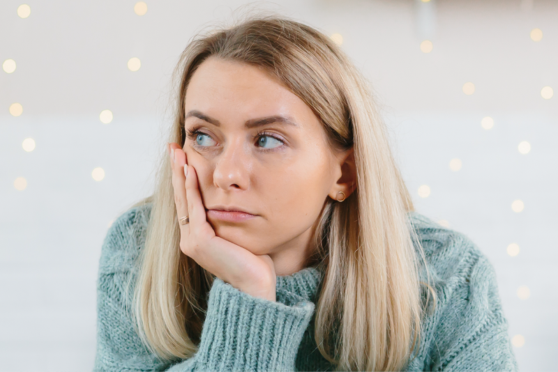 Woman feeling stressed during the holida